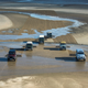 Image for article titled A Gigantic Sand Drawing Is How Land Rover Said Farewell To The Defender
